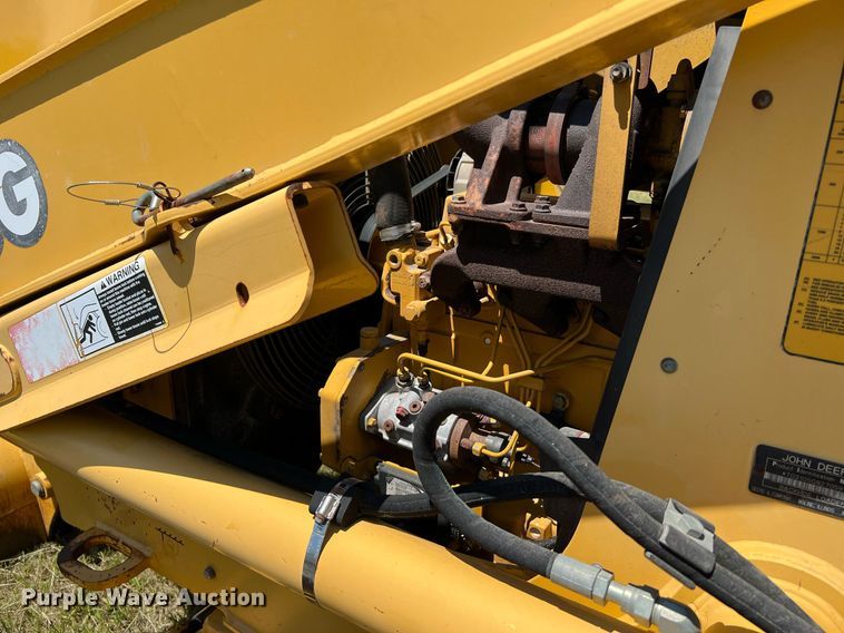 image for item DQ2055 2004 John Deere 310SG  backhoe