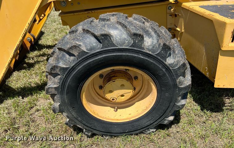 image for item DQ2055 2004 John Deere 310SG  backhoe