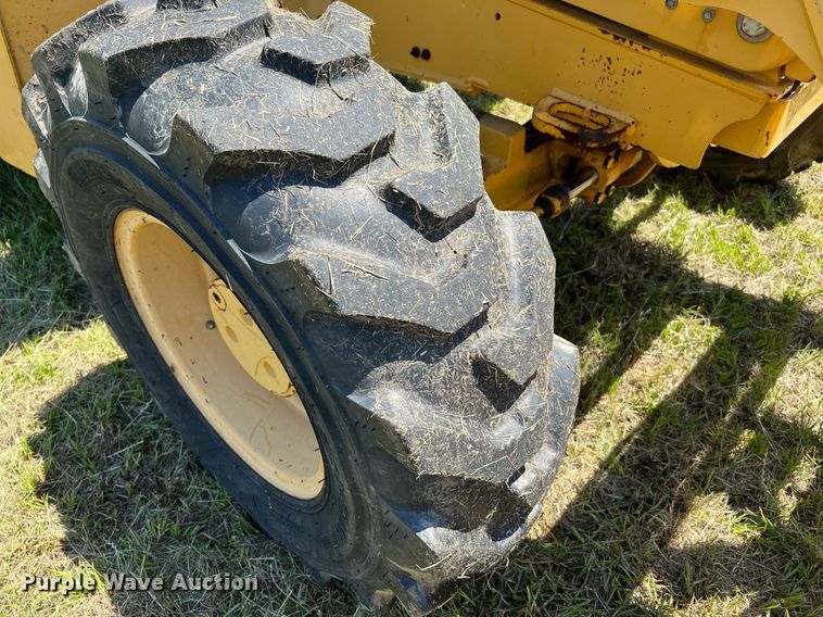 image for item DQ2055 2004 John Deere 310SG  backhoe