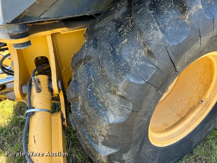 image for item DQ2055 2004 John Deere 310SG  backhoe