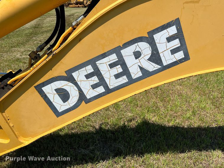 image for item DQ2055 2004 John Deere 310SG  backhoe