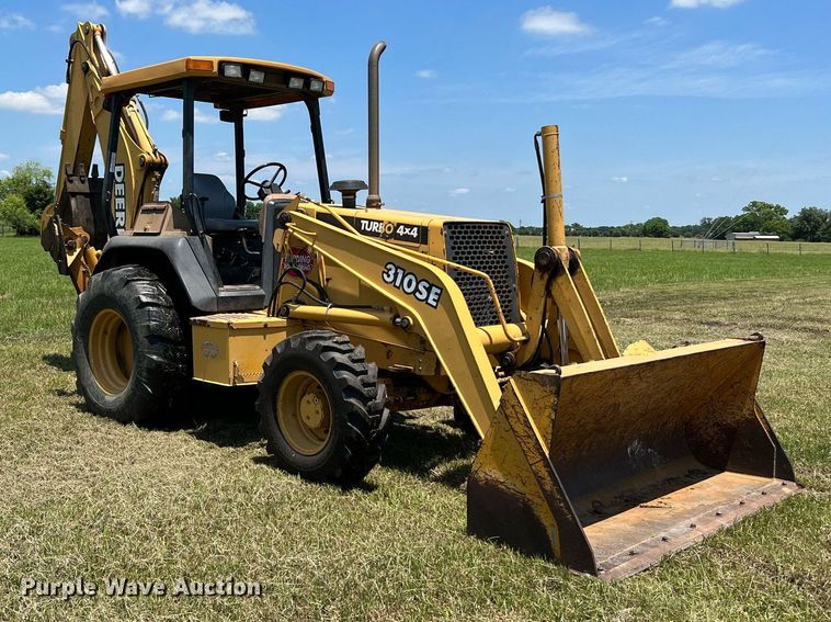 image for item DQ2056 1999 John Deere 310SE  backhoe
