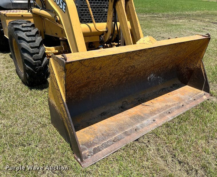 image for item DQ2056 1999 John Deere 310SE  backhoe