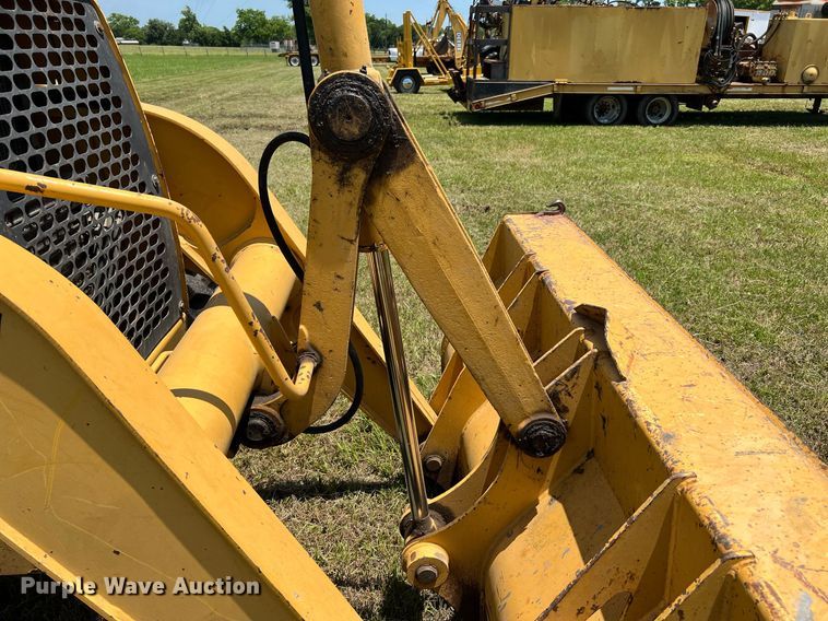 image for item DQ2056 1999 John Deere 310SE  backhoe