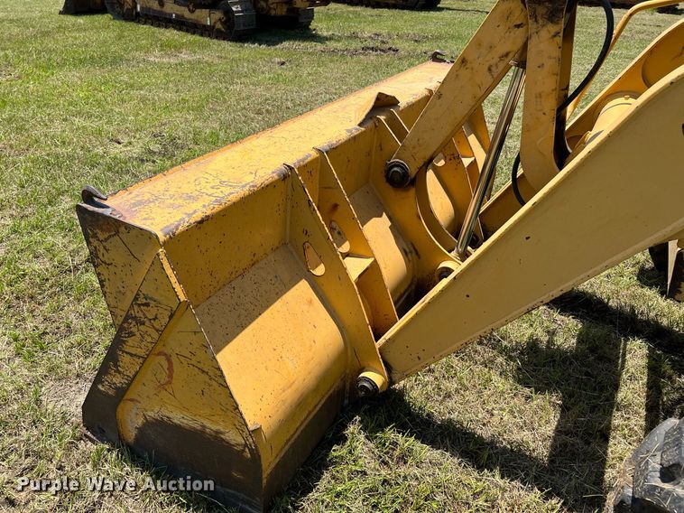 image for item DQ2056 1999 John Deere 310SE  backhoe