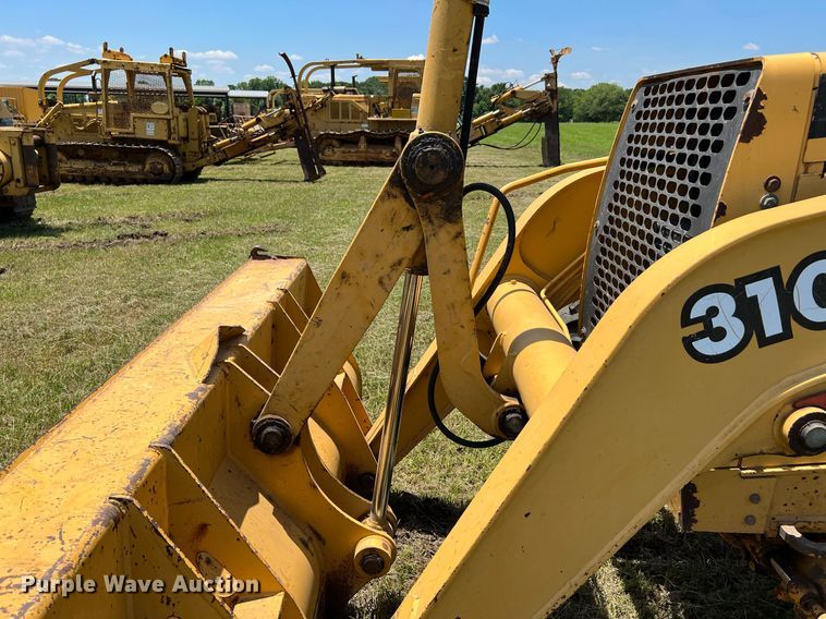 image for item DQ2056 1999 John Deere 310SE  backhoe