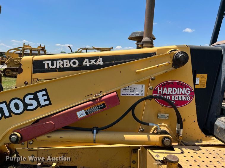 image for item DQ2056 1999 John Deere 310SE  backhoe