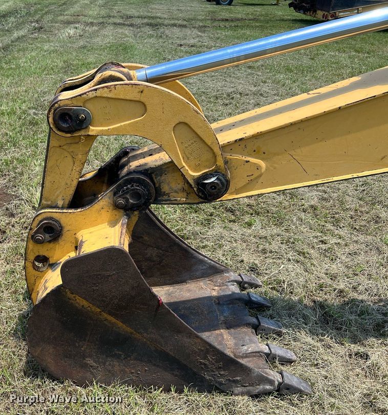 image for item DQ2056 1999 John Deere 310SE  backhoe