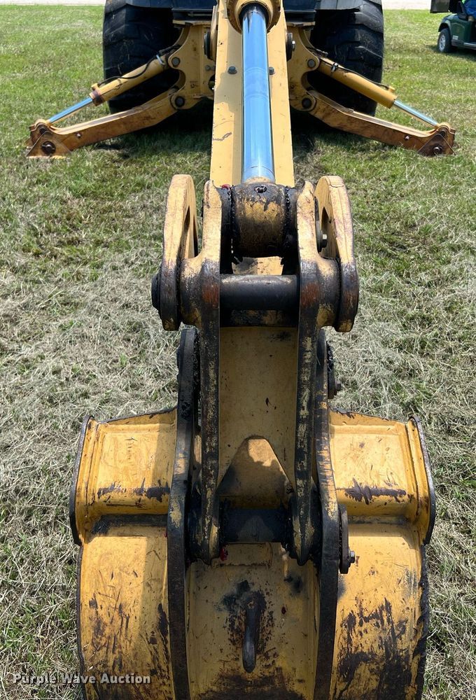 image for item DQ2056 1999 John Deere 310SE  backhoe