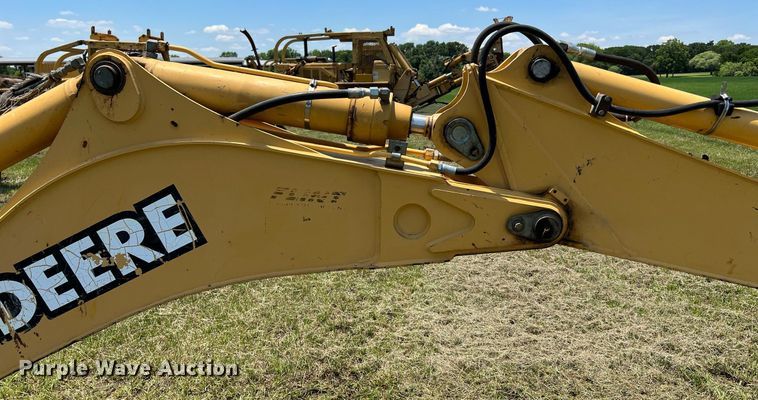 image for item DQ2056 1999 John Deere 310SE  backhoe