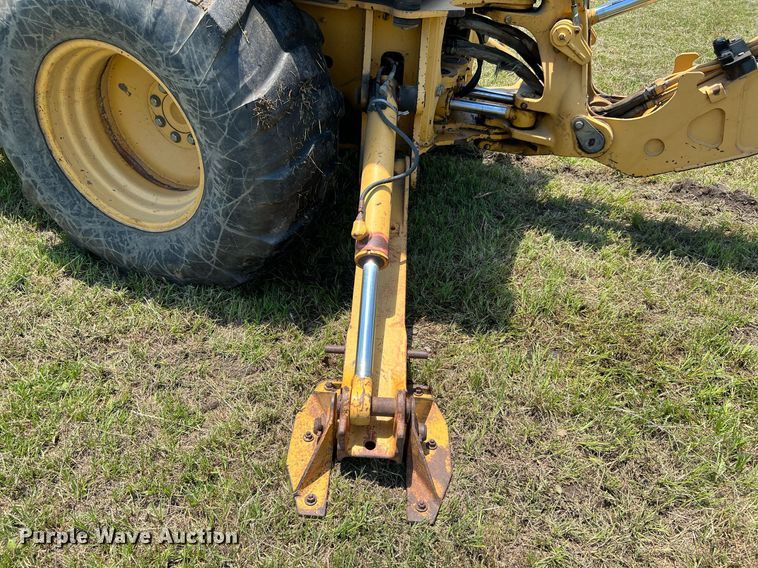 image for item DQ2056 1999 John Deere 310SE  backhoe