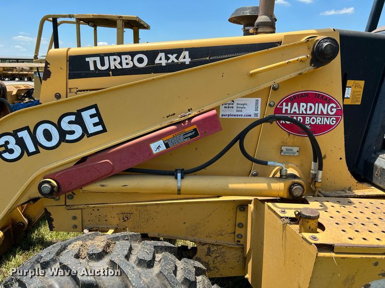 image for item DQ2056 1999 John Deere 310SE  backhoe