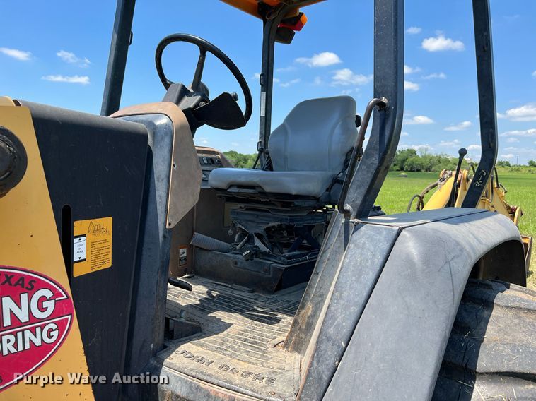 image for item DQ2056 1999 John Deere 310SE  backhoe