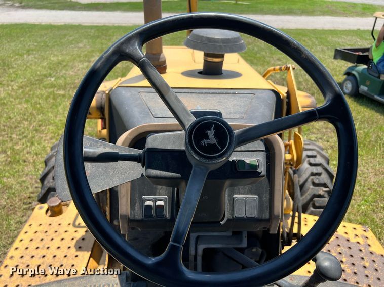 image for item DQ2056 1999 John Deere 310SE  backhoe