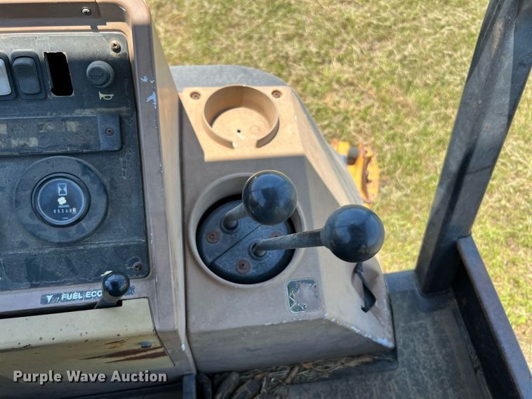 image for item DQ2056 1999 John Deere 310SE  backhoe