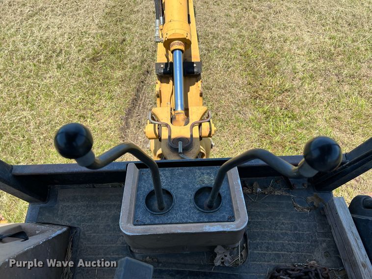 image for item DQ2056 1999 John Deere 310SE  backhoe