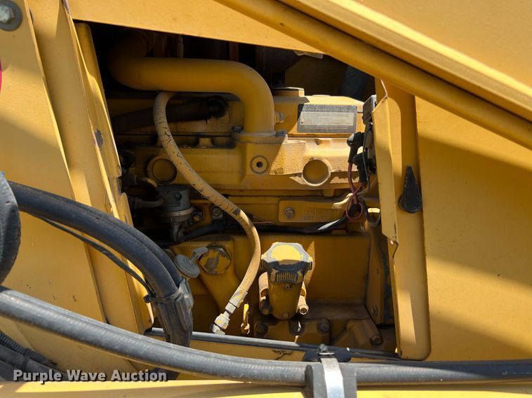 image for item DQ2056 1999 John Deere 310SE  backhoe