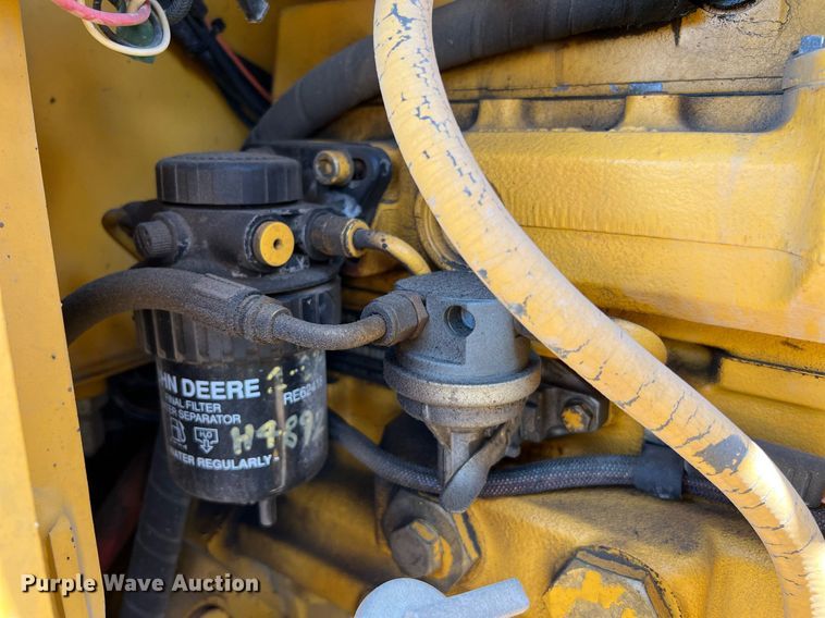 image for item DQ2056 1999 John Deere 310SE  backhoe