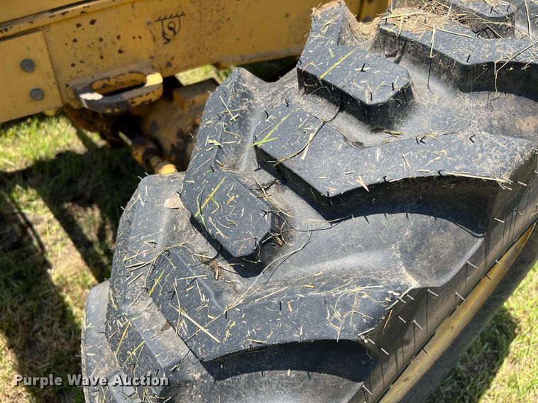 image for item DQ2056 1999 John Deere 310SE  backhoe