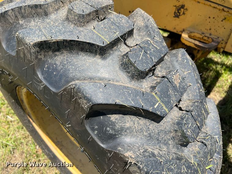 image for item DQ2056 1999 John Deere 310SE  backhoe