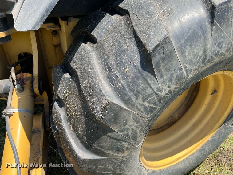 image for item DQ2056 1999 John Deere 310SE  backhoe