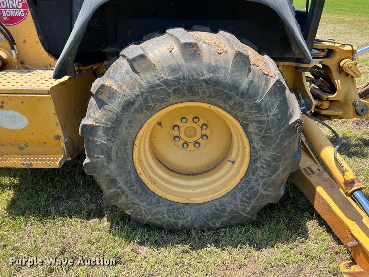 image for item DQ2056 1999 John Deere 310SE  backhoe
