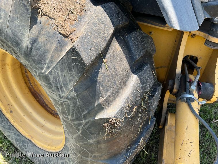 image for item DQ2056 1999 John Deere 310SE  backhoe