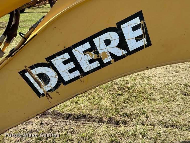 image for item DQ2056 1999 John Deere 310SE  backhoe