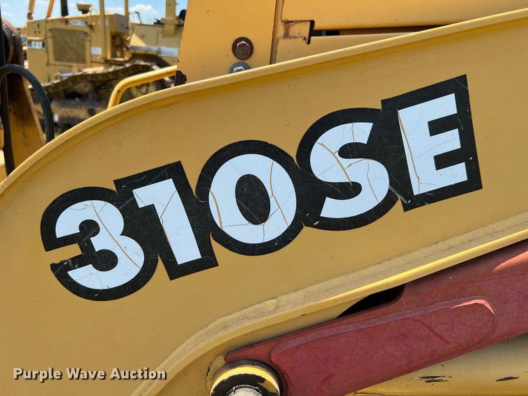 image for item DQ2056 1999 John Deere 310SE  backhoe