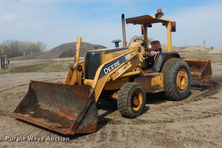 image for item DQ7319 2004 John Deere 210LE  landscape tractor