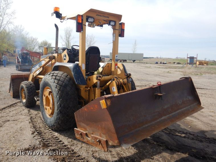 image for item DQ7319 2004 John Deere 210LE  landscape tractor