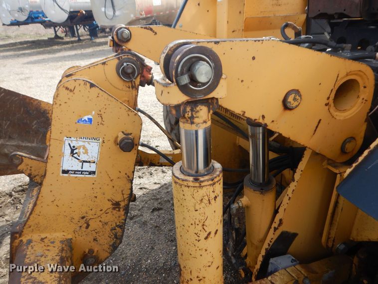 image for item DQ7319 2004 John Deere 210LE  landscape tractor