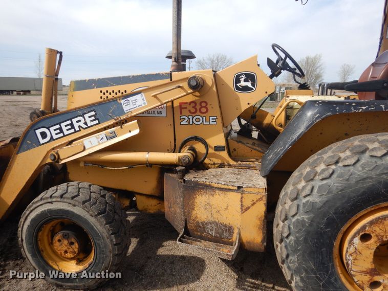 image for item DQ7319 2004 John Deere 210LE  landscape tractor