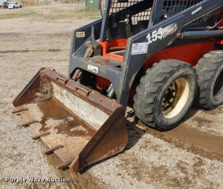 image for item DQ7320 2002 Thomas T153S  skid steer loader