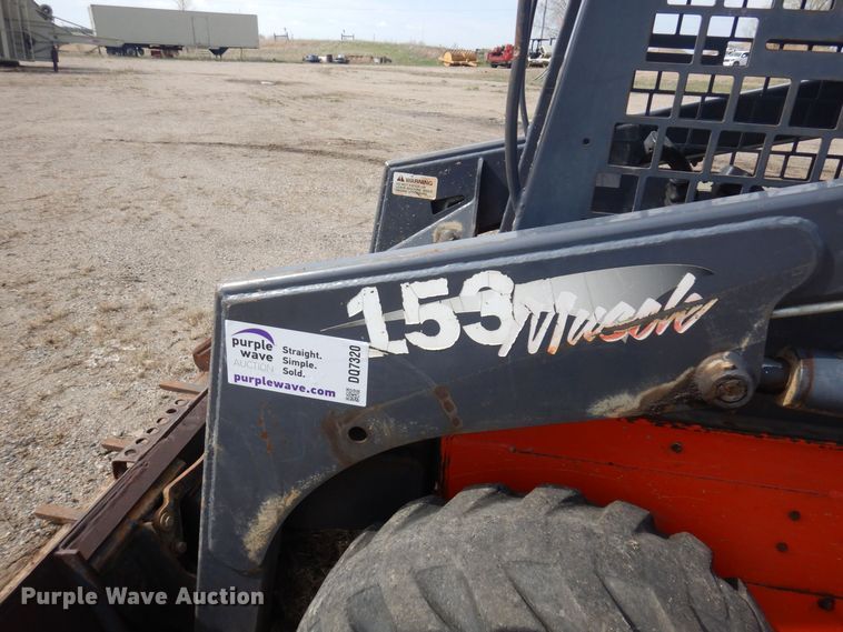 image for item DQ7320 2002 Thomas T153S  skid steer loader
