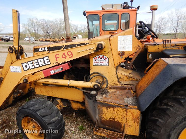 image for item DQ7326 John Deere 210LE  landscape tractor