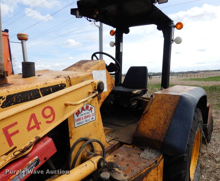 image for item DQ7326 John Deere 210LE  landscape tractor