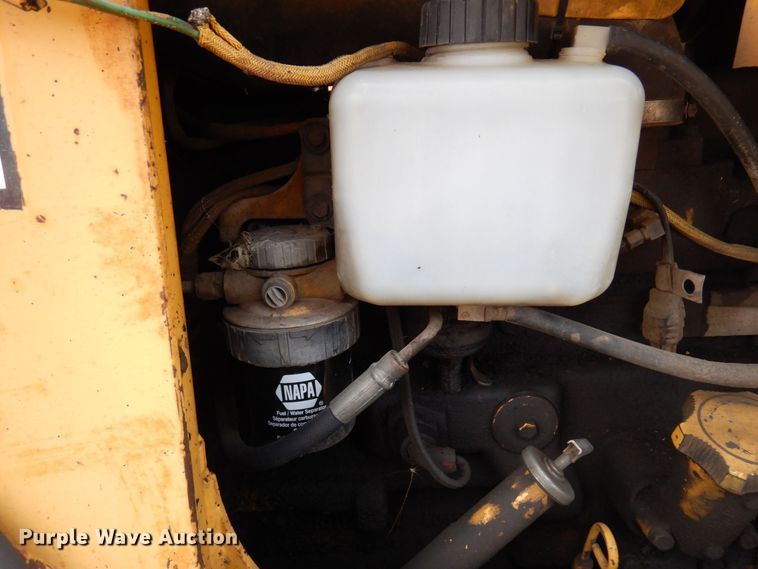 image for item DQ7326 John Deere 210LE  landscape tractor