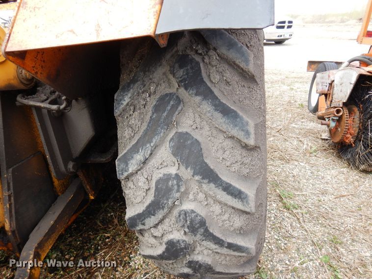 image for item DQ7326 John Deere 210LE  landscape tractor