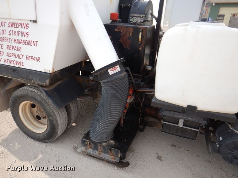 image for item KN9965 2016 Isuzu NPR  street sweeper truck