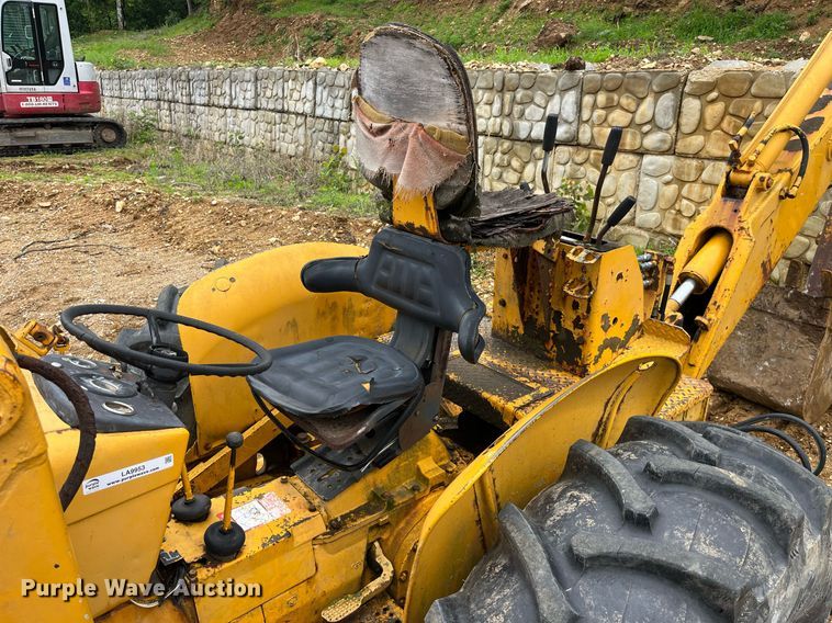 image for item LA9953 John Deere T5W3C  backhoe