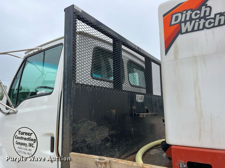 image for item LI9725 2008 Sterling Acterra  flatbed truck with fluid mixing system