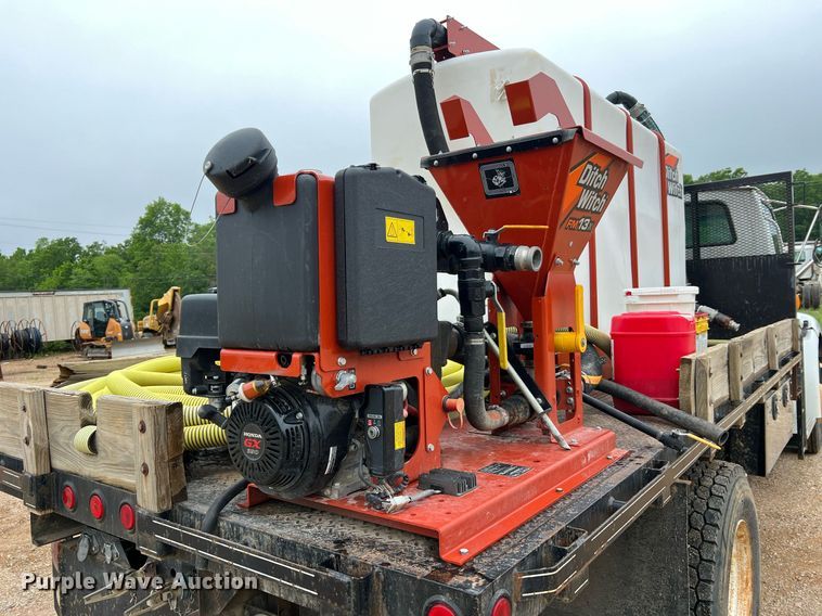 image for item LI9725 2008 Sterling Acterra  flatbed truck with fluid mixing system