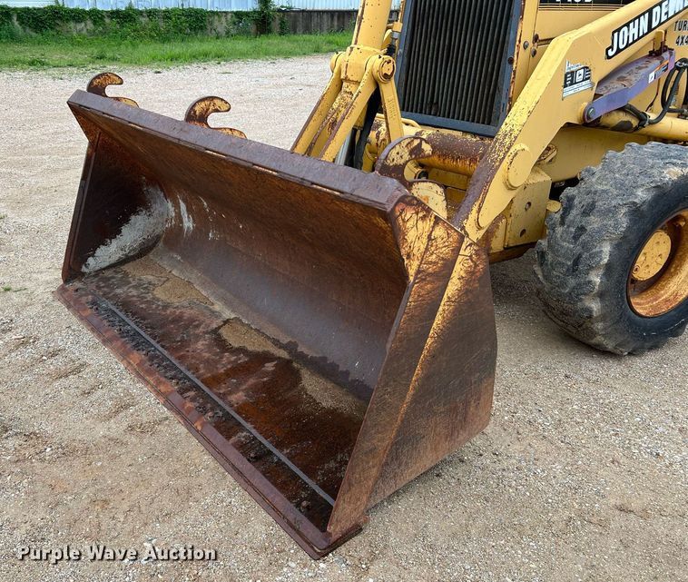 image for item LI9735 1996 John Deere 710D  backhoe
