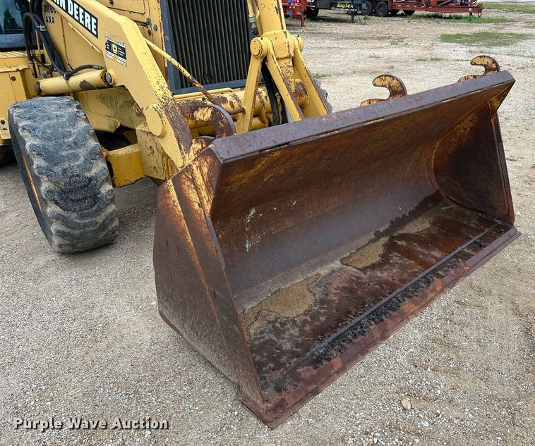 image for item LI9735 1996 John Deere 710D  backhoe