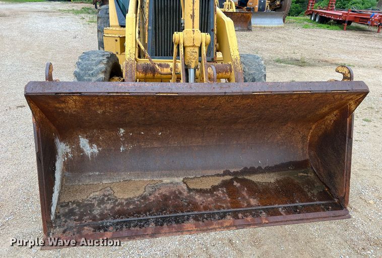 image for item LI9735 1996 John Deere 710D  backhoe