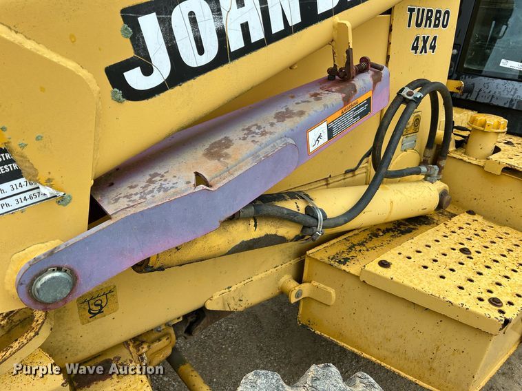 image for item LI9735 1996 John Deere 710D  backhoe