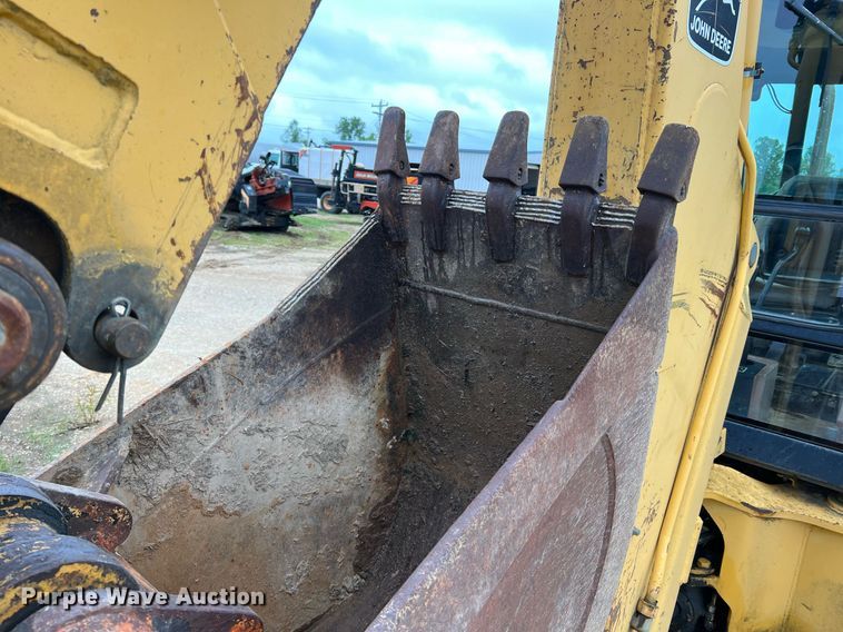 image for item LI9735 1996 John Deere 710D  backhoe