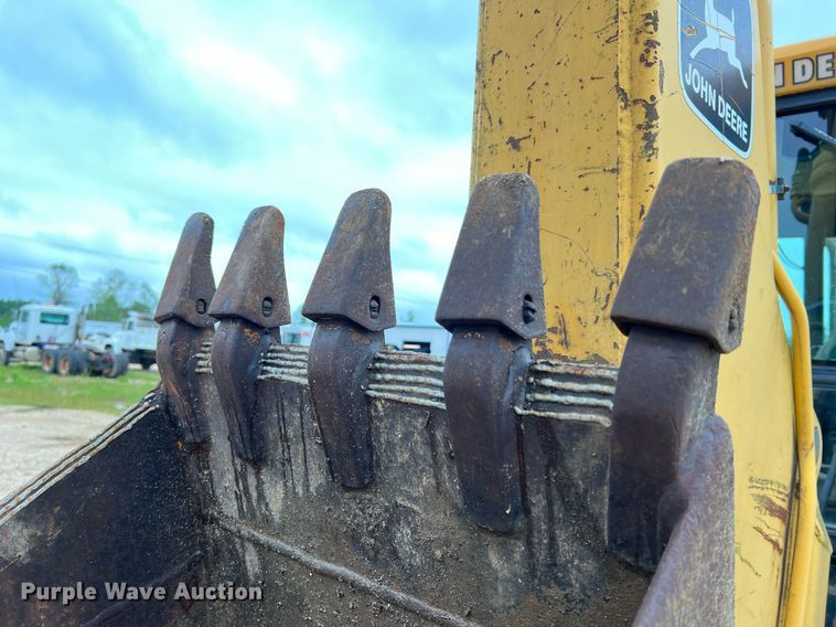 image for item LI9735 1996 John Deere 710D  backhoe