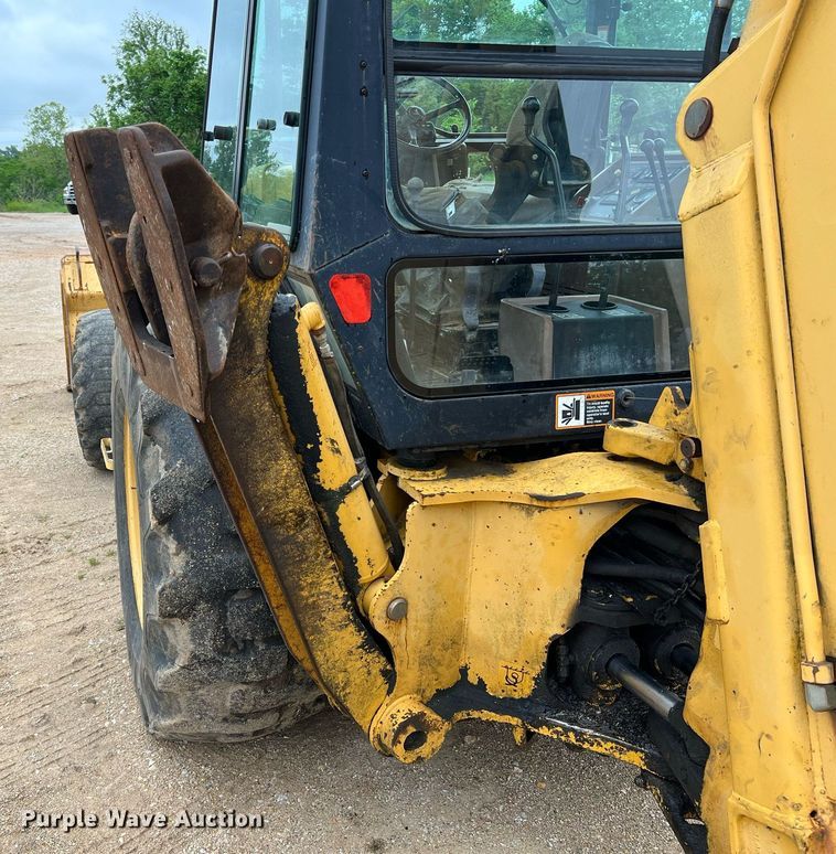 image for item LI9735 1996 John Deere 710D  backhoe